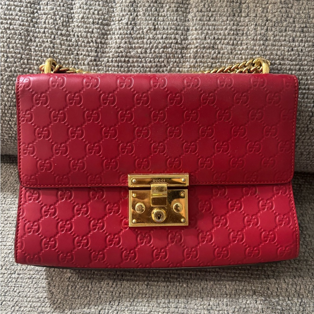 Gucci Embossed Red Shoulder Bag with Gold Accents